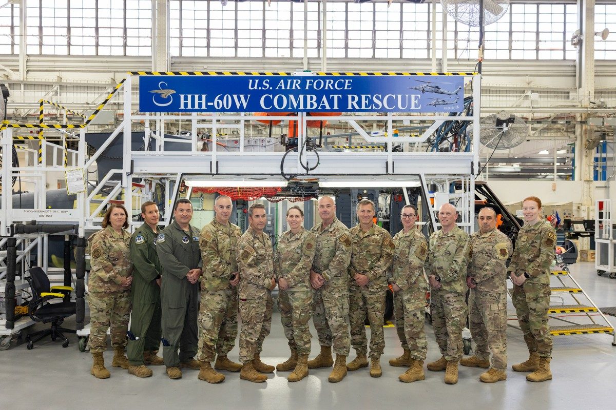 U.S. Air Force members of the New York Air National Guard pose in front of  HH-60W aircraft #53 – destined to be their first Combat Rescue Helicopter – while on a tour of Sikorsky’s Stratford headquarters and digital factor. Photo courtesy Sikorsky, a Lockheed Martin company.